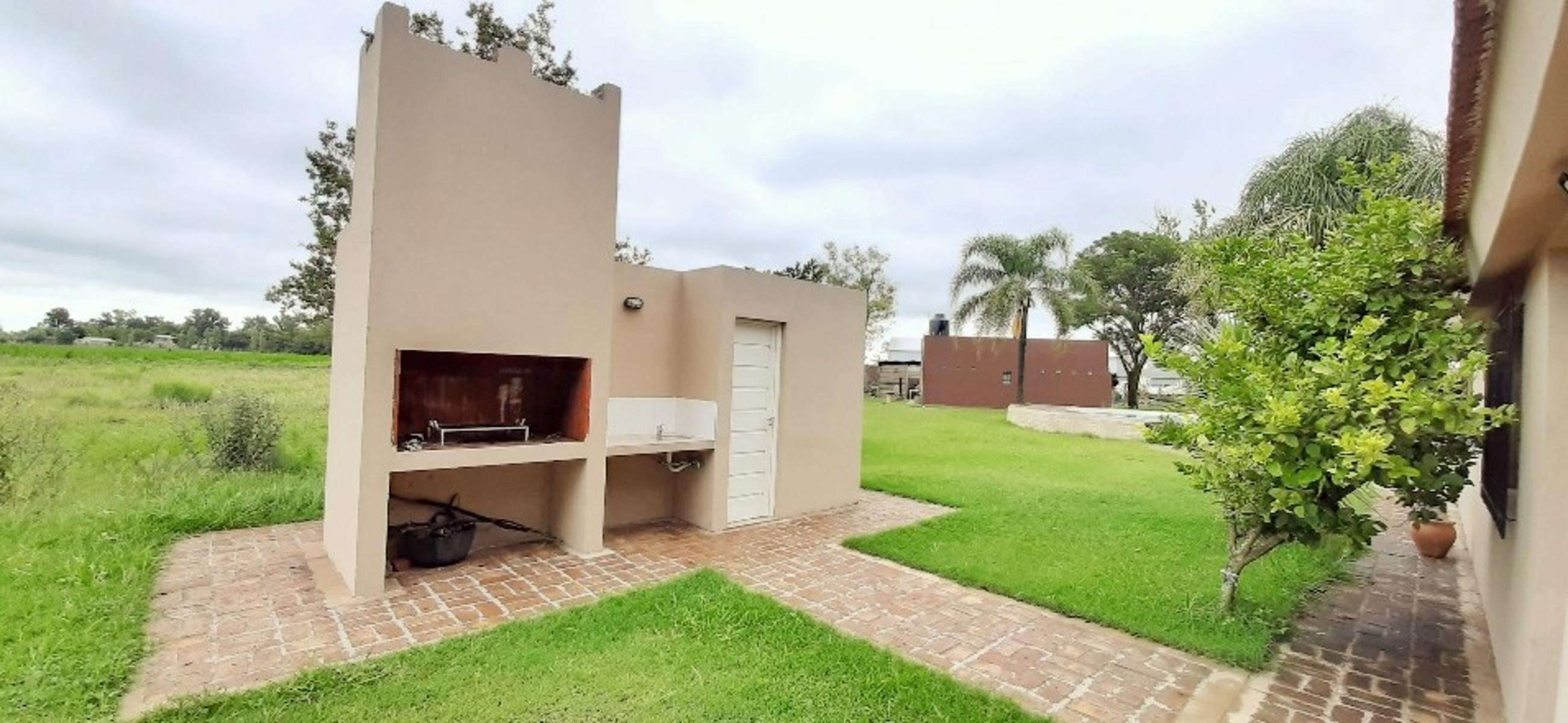 Ruiz Bienes Raíces Los Pinos 2 casa sobre boulevard central Ruta AO12 kilómetro 9 · Rosario — foto 4