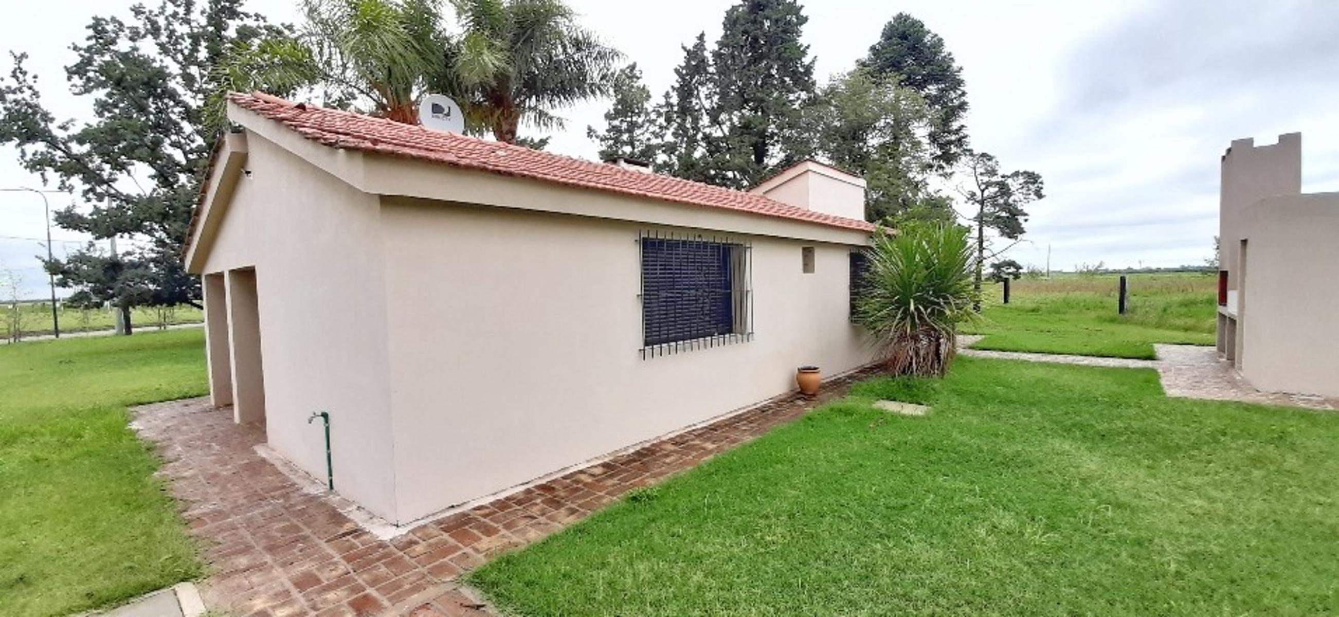 Ruiz Bienes Raíces Los Pinos 2 casa sobre boulevard central Ruta AO12 kilómetro 9 · Rosario — foto 6