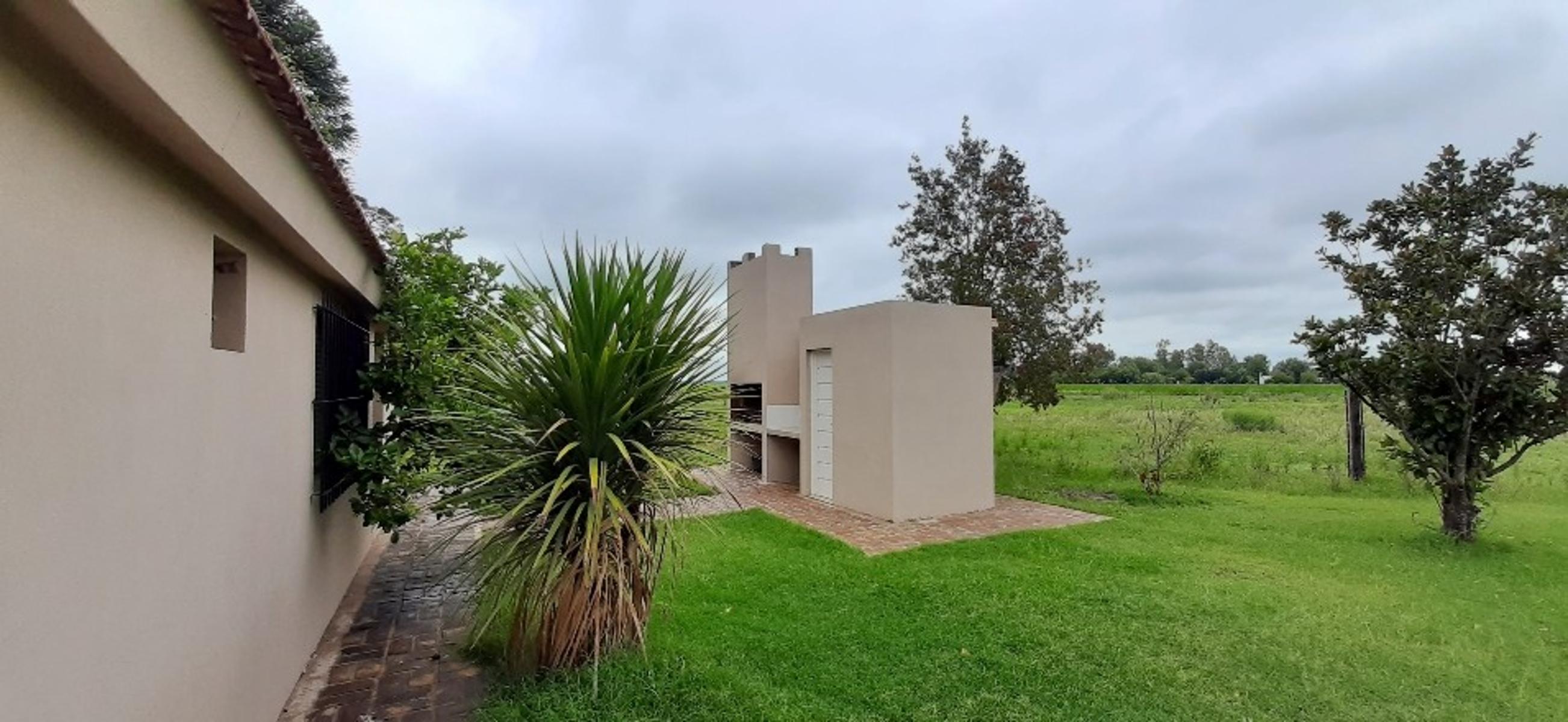 Ruiz Bienes Raíces Los Pinos 2 casa sobre boulevard central Ruta AO12 kilómetro 9 · Rosario — foto 7