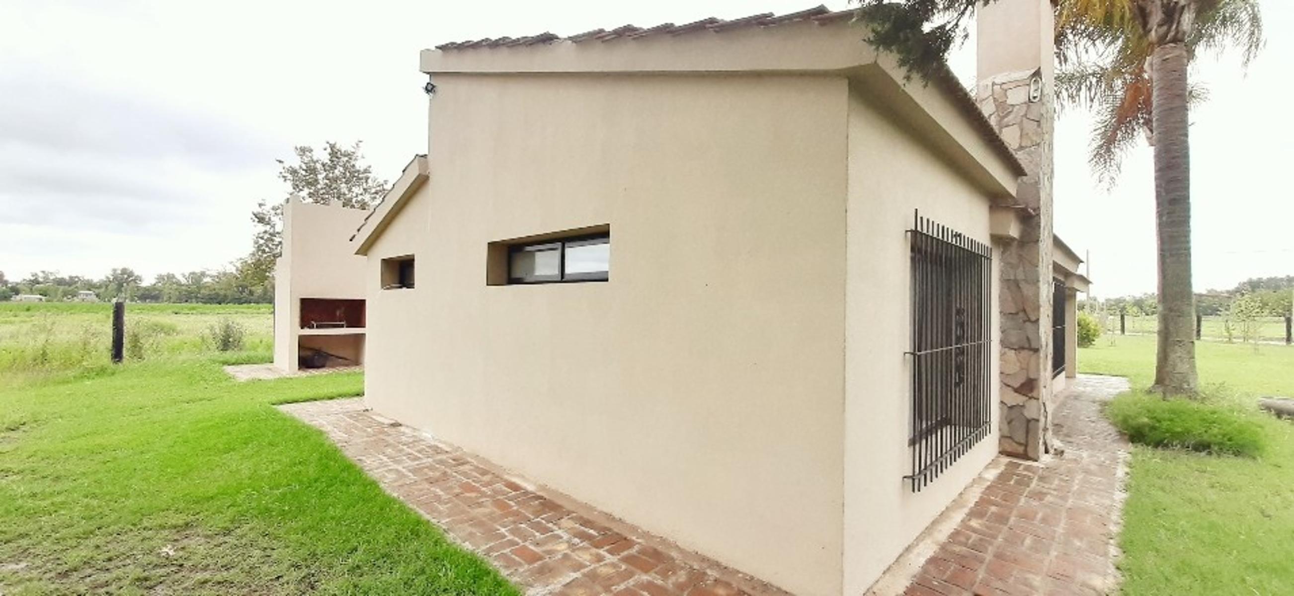 Ruiz Bienes Raíces Los Pinos 2 casa sobre boulevard central Ruta AO12 kilómetro 9 · Rosario — foto 9