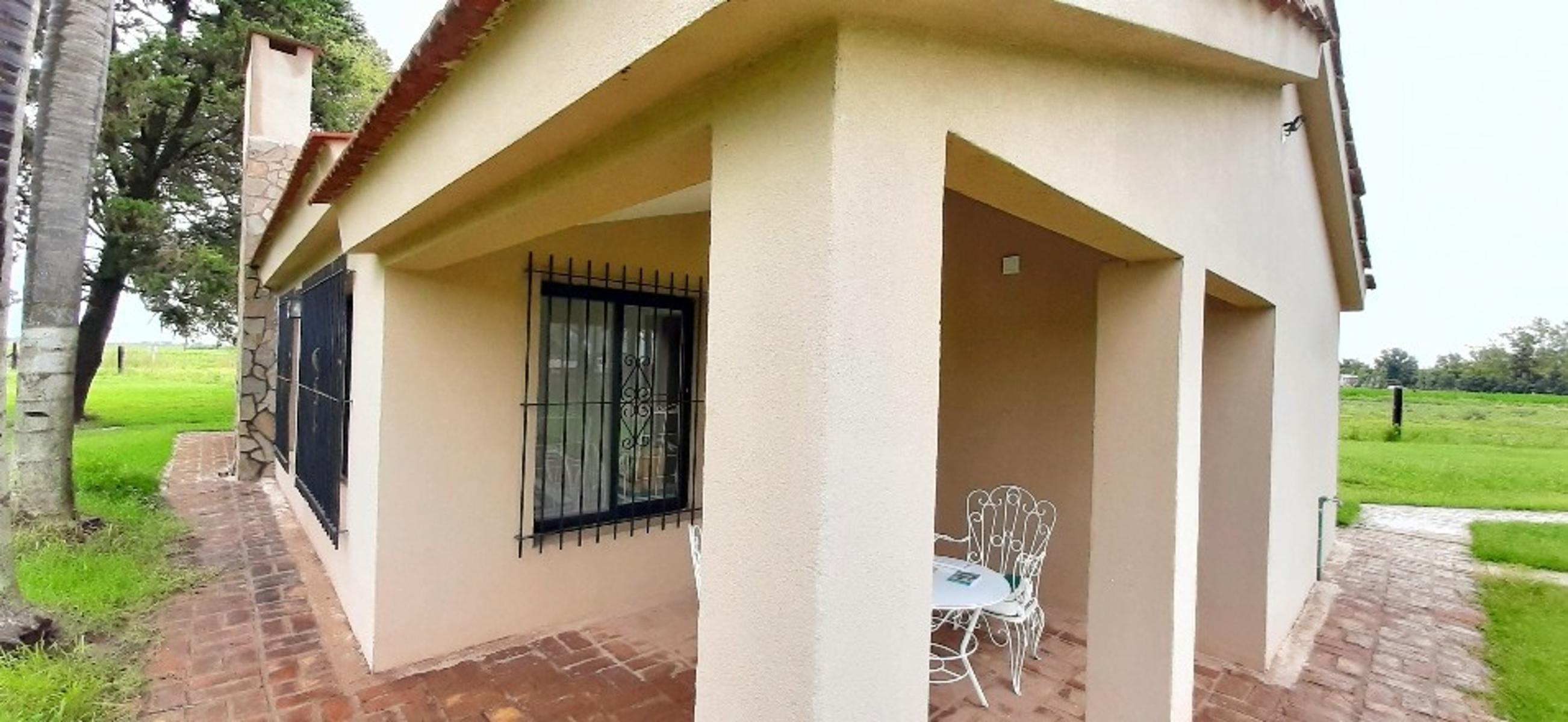 Ruiz Bienes Raíces Los Pinos 2 casa sobre boulevard central Ruta AO12 kilómetro 9 · Rosario — foto 10