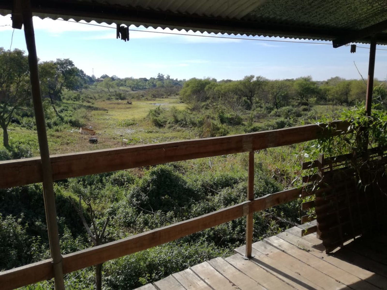 GRAN TERRENO Y CASA FRENTE AL RÍO - PARAJE LOS 2 OMBUES