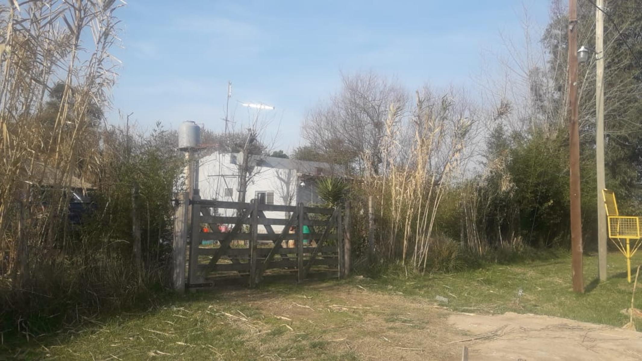 VENTA DE 7  LOTES CON 2 VIVIENDAS  EN DOMSELAAR
