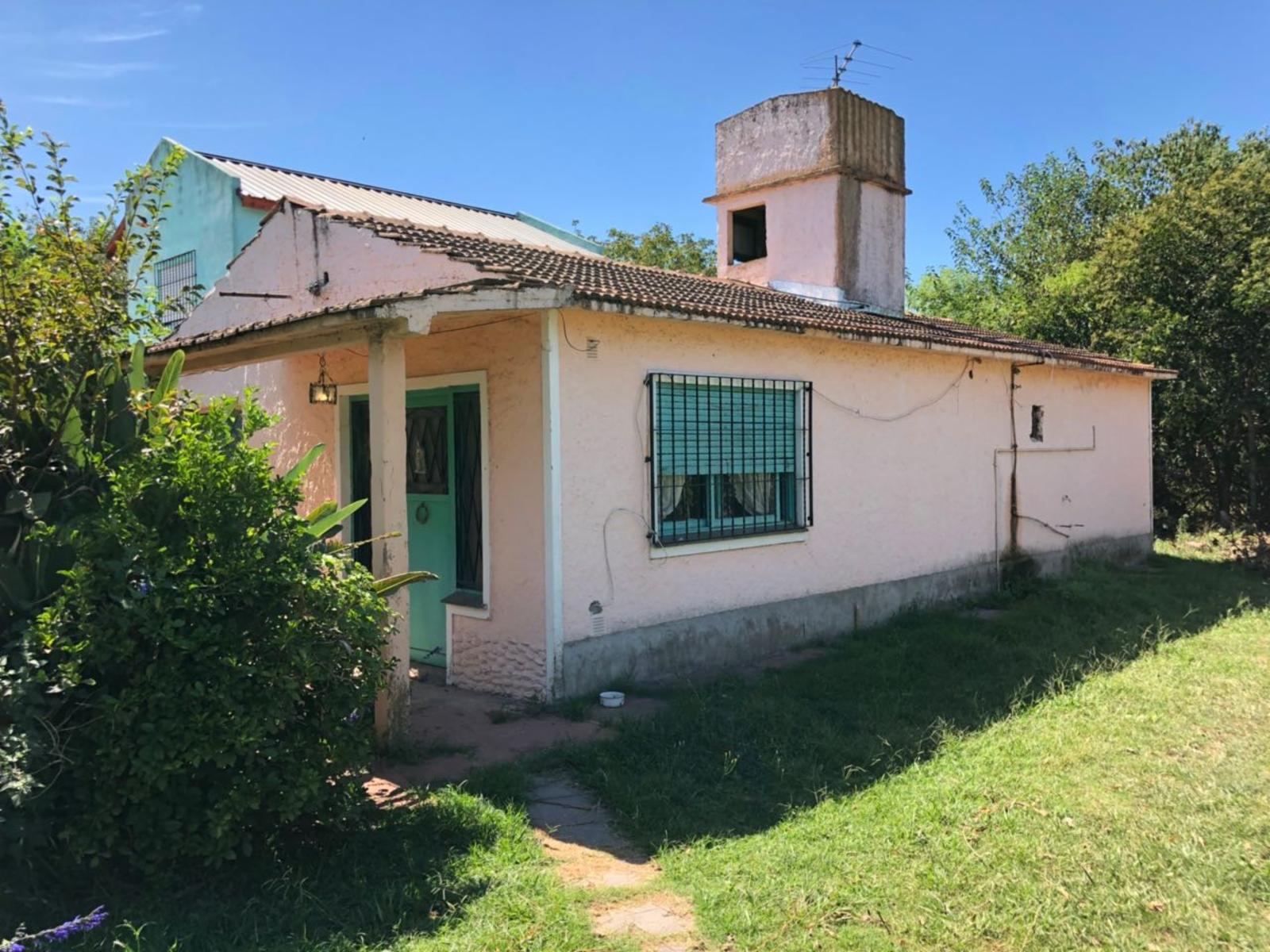 Excelente casa con dos locales