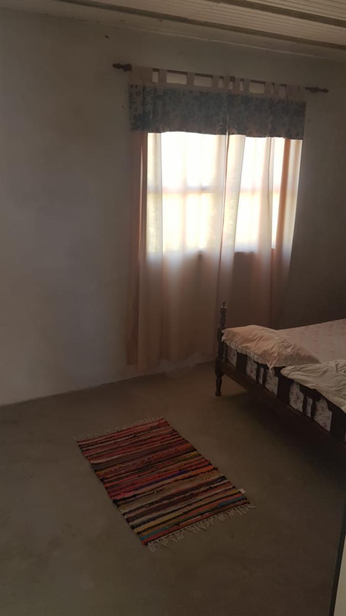 PROPIEDAD EN LOTE PROPIO CON LOCAL COMERCIAL, 6 DEPARTAMENTOS DE 2 AMBIENTES Y ENTRADA PARA AUTOS.