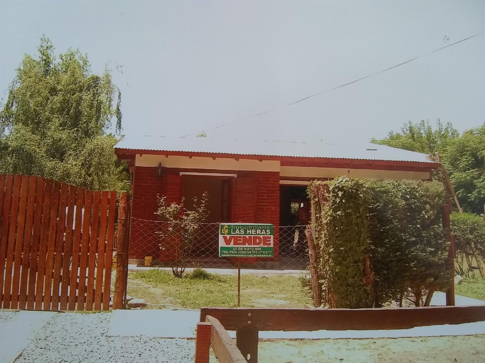 casa con tres dormitorios