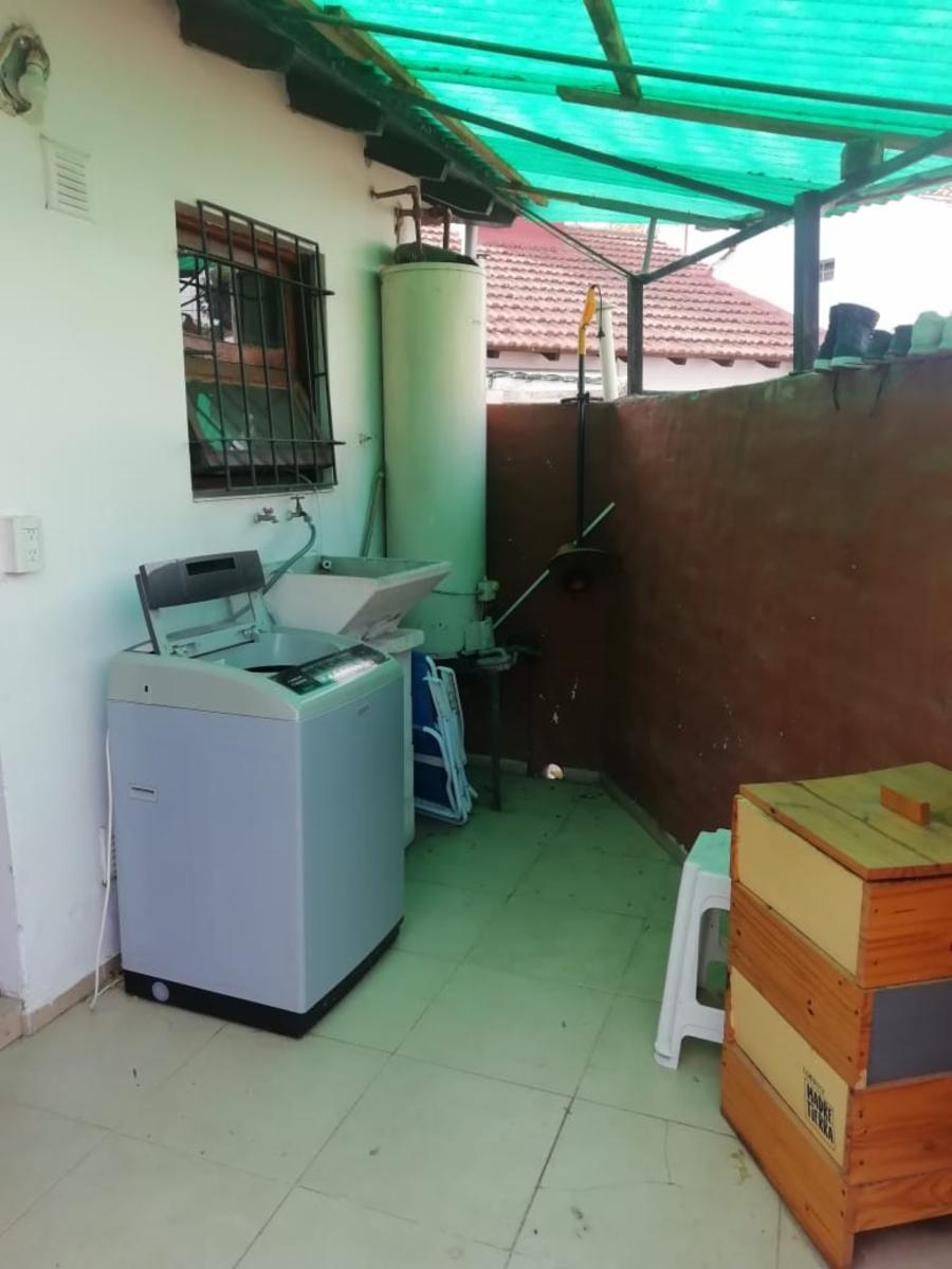 CASA DE DOS DORMITORIOS EN SANTA RITA , CON PATIO Y COCHERA