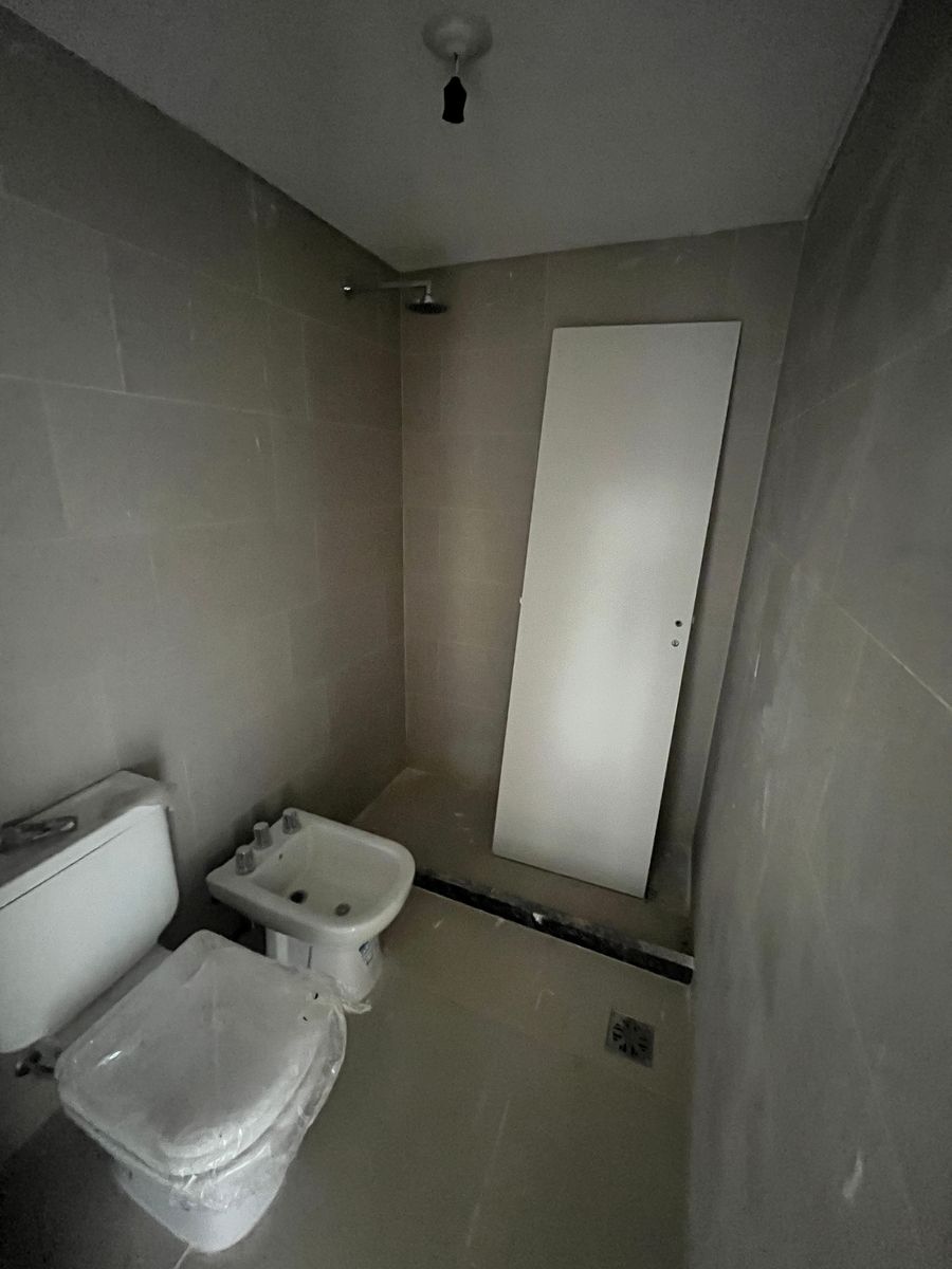 VENTA DEPARTAMENTO DOS DORMITORIOS CON BALCON EN L Y COCHERA · Lules — foto 8