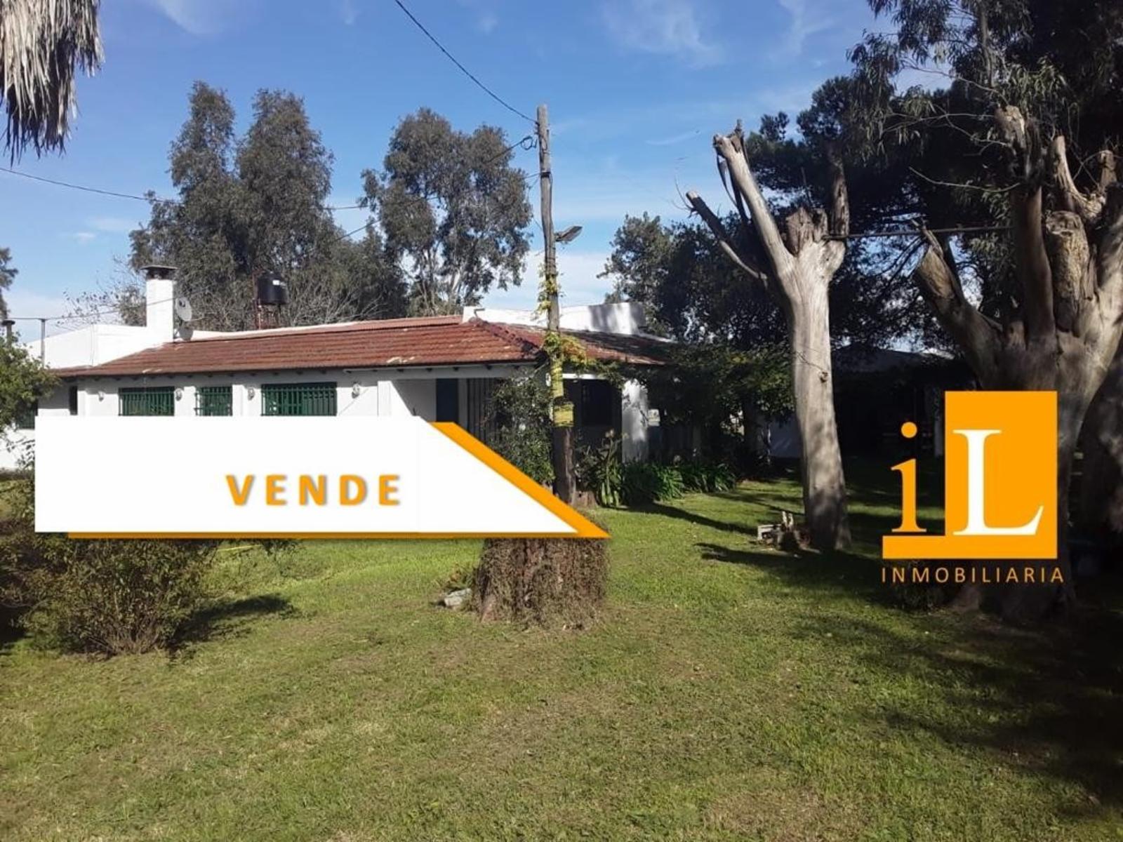 13 hectareas con mejoras en Loma Verde, sobre Ruta 215.